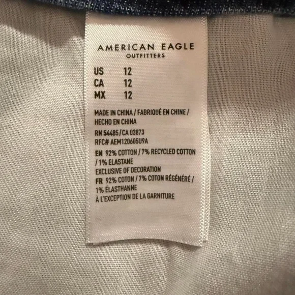 American Eagle denim shorts featuring a distressed look and frayed raw hem - Picture 4 of 8